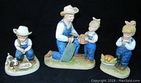 Set of three Denim Days 1985 Homco figurines depicting little farmers in denim overalls and hats with farm accessories against a black background