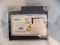 Photo of the packaged Home & Hotel brand Luxury Comfort Platinum Microfiber Series 8800 king size sheet set in dark blue.