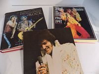 Photo showing three rock and roll books: Billboard Illustrated Encyclopedia of Rock hardcover, Rolling Stone The Complete Covers 1967-1997 hardcover, and softcover Elvis photo album.