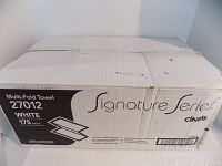 Box showing Cintas Signature Series branding, multi-fold towel model number 27012, white color, 175 sheets per pack.