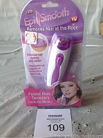 Epi Smooth hair removal system in original retail packaging showing branding and usage areas