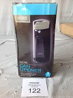 Image showing the product box of Living Solutions Electric Can Opener with the front panel design and warranty information.