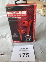Photo of COBY Wireless Bluetooth Earbuds retail packaging box showing product image and branding.