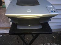 Front angle view of Dell Model A920 printer showing paper output tray and control panel buttons.