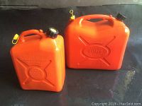 Photo of two orange plastic gas cans of different sizes, showing handle, spout cap, and safety markings.