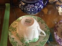 Underside of Shelley green floral teacup showing maker’s mark