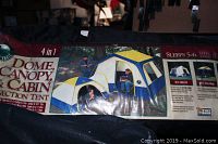 Photo of the 4 in 1 Dome, Canopy & Cabin Connection Tent packaging showing use and product details.
