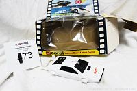 White Corgi James Bond Lotus Esprit car shown next to its original box with visible branding and marketing label.