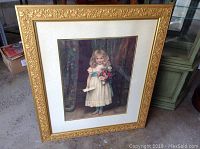 Framed large print showing the full artwork and ornate gold-tone frame.