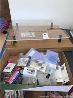 Clear acrylic extension table with four adjustable black legs