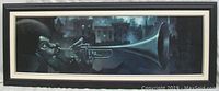 Full view of the framed print showing the jazz musician playing trumpet with city buildings in background