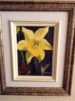 Framed oil painting of a yellow flower signed 'Robert Allen' with ornate brown frame and cream double matting.