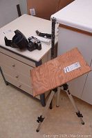 Overview photo including Fujica AX-1 camera, monopod, Manfrotto tripod with mounted wood plate on top