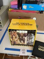 Yellow box containing multiple jewel CD cases of National Geographic magazines from 1888 to 1995