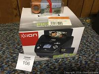 Box of Ion PICS 2 SD scanner showing product image and branding.