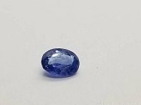 Front view of faceted sapphire showing color and clarity