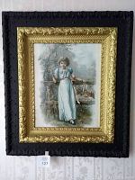 Framed art print depicting a young woman in an outdoor scene with a basket of flowers.