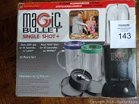 Magic Bullet Single Shot+ Blender 12 Piece Set in original box, showing all components and branding.