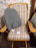 Wooden slider rocking chair with cushions, showing the gray Obus backrest placed on the seat.