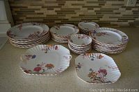 Overview of all plate stacks with two serving plates displayed at front