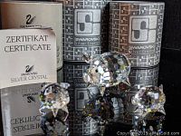 Three Swarovski Silver Crystal pig figurines with certificate and three original boxes.