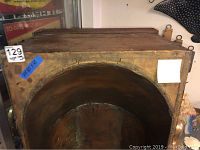 Overhead view of interior copper lining and wood frame