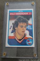 Front of the rookie card showing Dale Hawerchuk in Winnipeg Jets uniform with team logo and name.