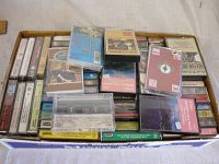 Box containing a large collection of Celtic cassette tapes with various covers visible.