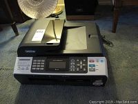 Full view of Brother Professional Series Multi-Function Center with flatbed scanner and control panel visible.