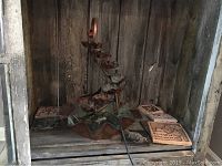 Photo of overall copper fountain with scalloped tiers and 4 ceramic tiles on a wooden shelf