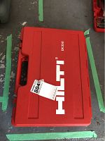 Closed red Hilti DX 350 carrying case showing Hilti logo and DX 350 text.