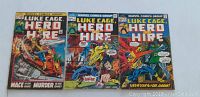 Front covers of three Hero for Hire Luke Cage comic books, issues #3, 7, and 9, showing colorful action scenes with characters