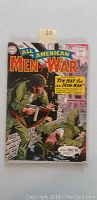 Front cover of the comic book featuring wartime soldiers in green uniforms, one wounded, with the title 'All American Men of War' and subtitle about 'Tin Hat for Iron Man.'