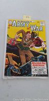 Front cover of vintage comic book Our Army at War Issue #93 showing soldier in combat with weapons and title text
