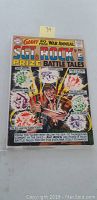 Front cover of the 80-page annual Sgt Rock Prize Battle Tales comic book, showing character Sgt Rock in wartime action scenes with colorful comic art and title.