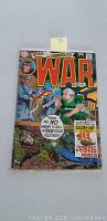 Front cover view of the Star Spangled War Stories comic book showing the illustrated war scene and title details.