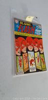Front cover of the vintage Flash comic book showing multiple images of The Flash in action poses, title and publication details.