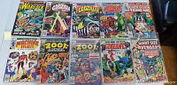 Photo showing front covers of ten older Marvel comics: Warlock #3, several Godzilla issues, Machine Man #10, two 2001: A Space Odyssey, Ironclaw, and Giant-Size Avengers.