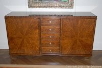 Front view of buffet cabinet showing veneer pattern and layout of drawers and doors