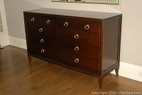 Front elevation of dresser showing drawer configuration, finish, and hardware
