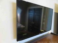 Front angled view of TV showing screen and bezel