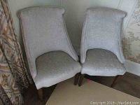 Front view of both chairs showing overall style and dimensions
