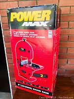 Front view of the Power Max 8 inch band saw original box showing product branding and image of the band saw.