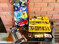Full lot showing fishing rod, reel, tackle boxes, PFD, and Rapala set