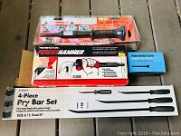 Overview of tools including Ramset HD22 tool, Remington Power Hammer, 4-piece pry bar set, and Remington Power Fasteners box.