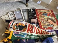 Overview of the retro lot with magazines, pennants, and Coronation coloring book