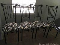 Front view of four chairs in a row