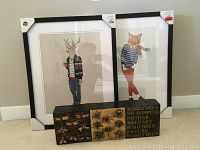 Two framed animal prints side by side with a three-panel lacquer insect art piece in front.