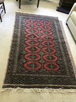 Full view of carpet laid on floor showing overall pattern and condition