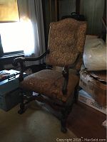 Full view of the vintage Queen Anne style armchair with upholstered seat and back